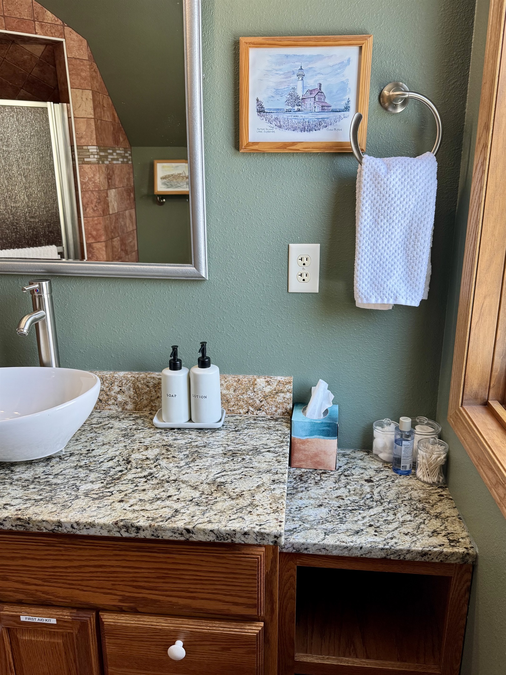 Provided toiletries makeup remover cotton pads q tips. Wooded views firepit and parking/ driveway out two large windows 