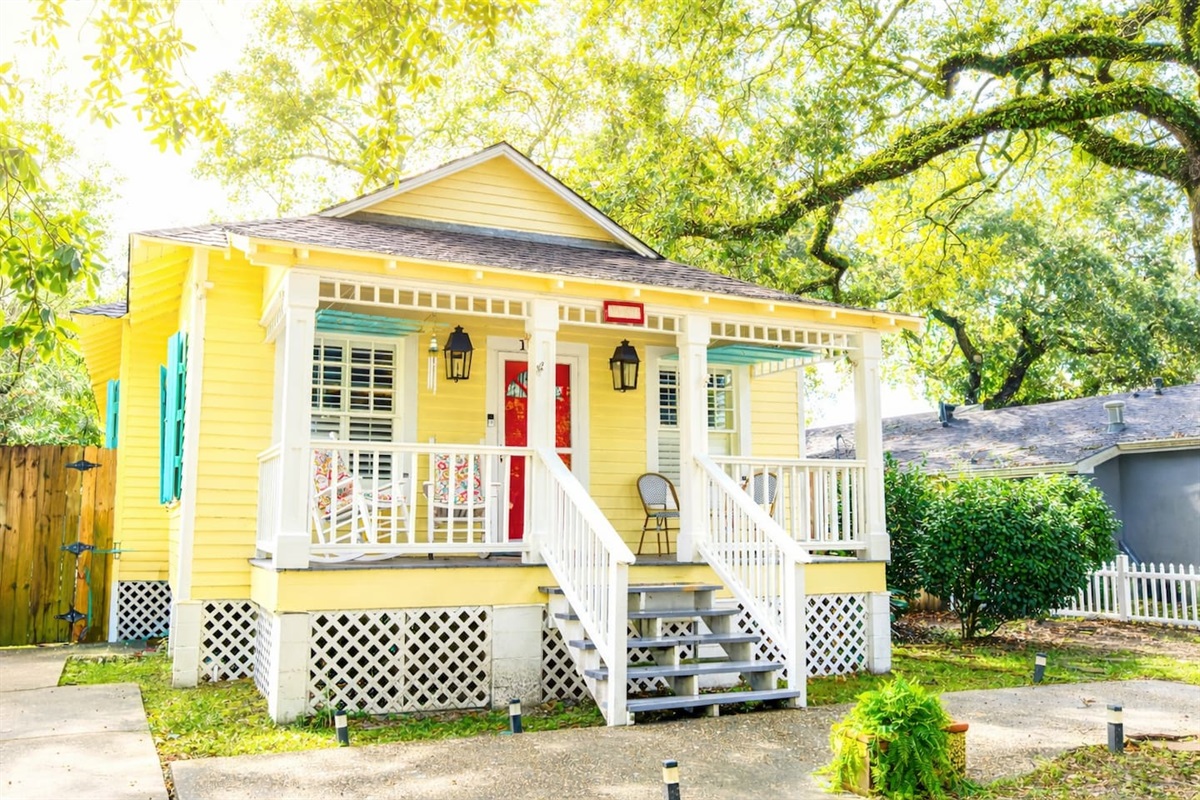 Coastal porch vibes just a short walk to the beach