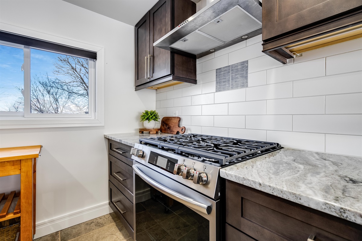 A sleek, Scandinavian-inspired cooking space.