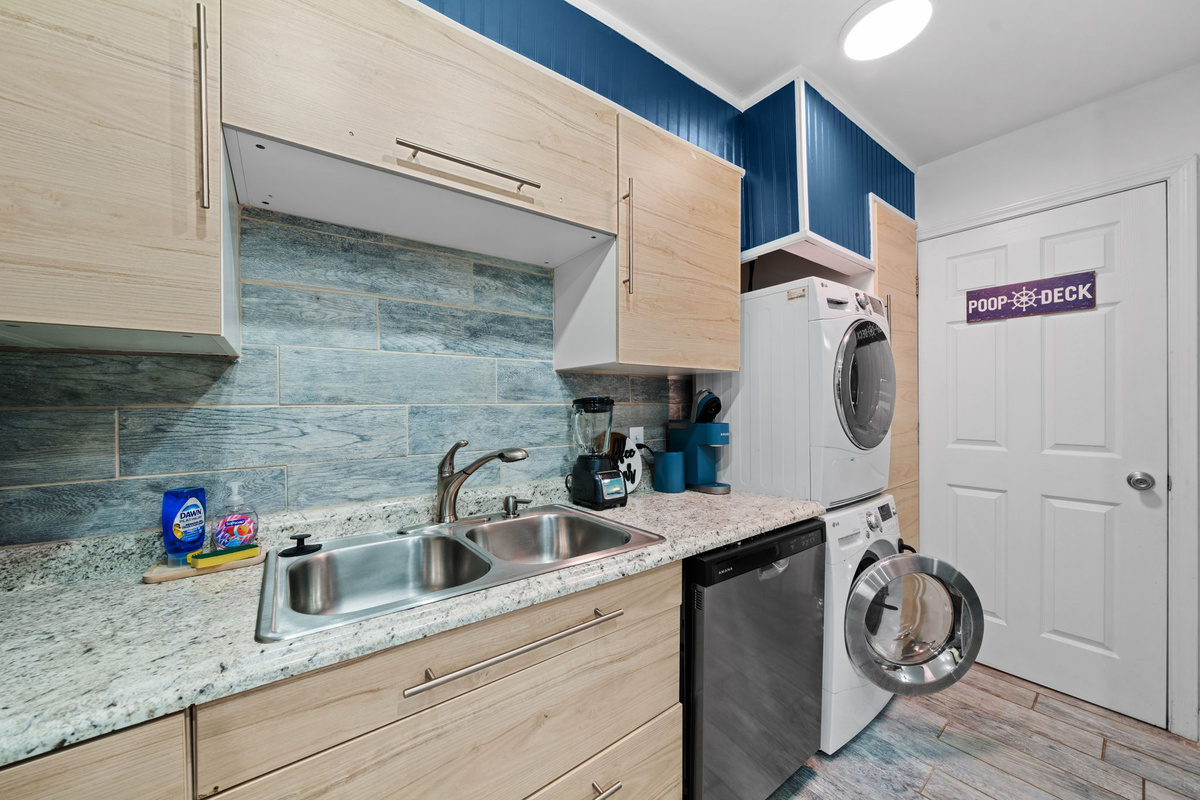 Kitchen with dishwasher and convenient in-unit washer and dryer