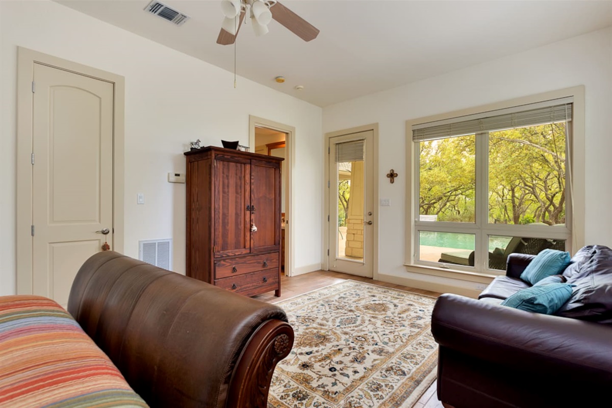 Pool House Bedroom with wide screen TV and private bathroom and entrance