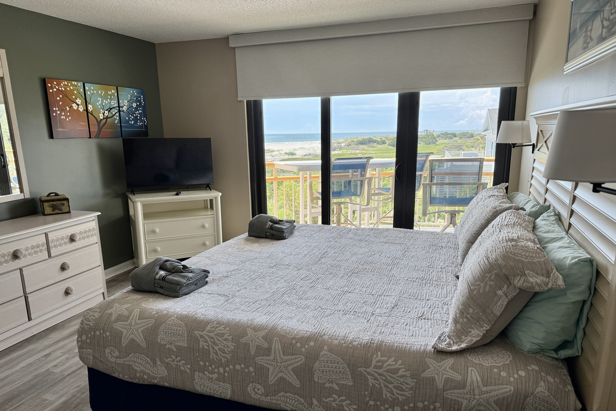 Primary Bedroom w/Sliding Glass Doors and Solar Shades