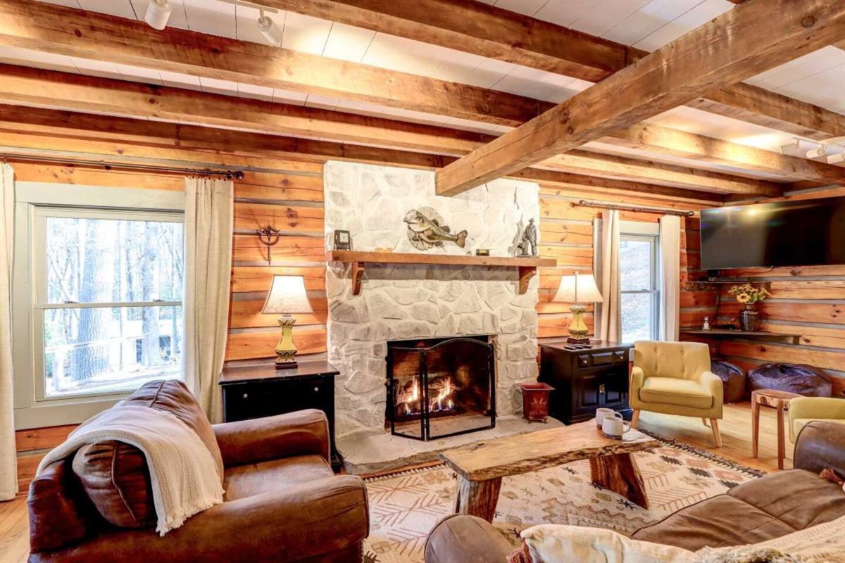 Gas fireplace in living room of the bid cabin.