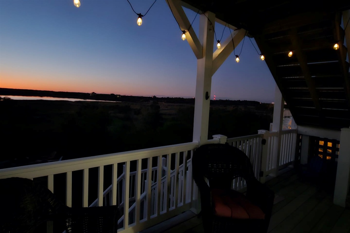 Evenings on the master bedroom porch overlooking the sound