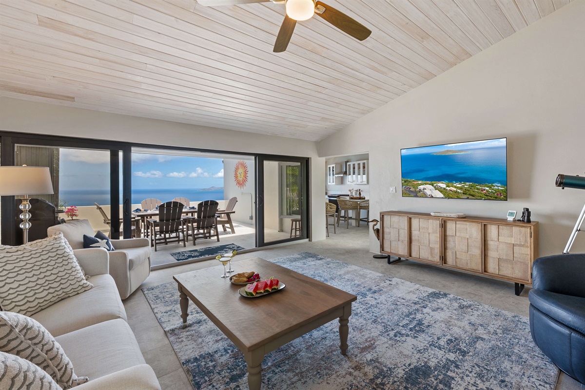 Spacious living room with plenty of seating to gather and connect.