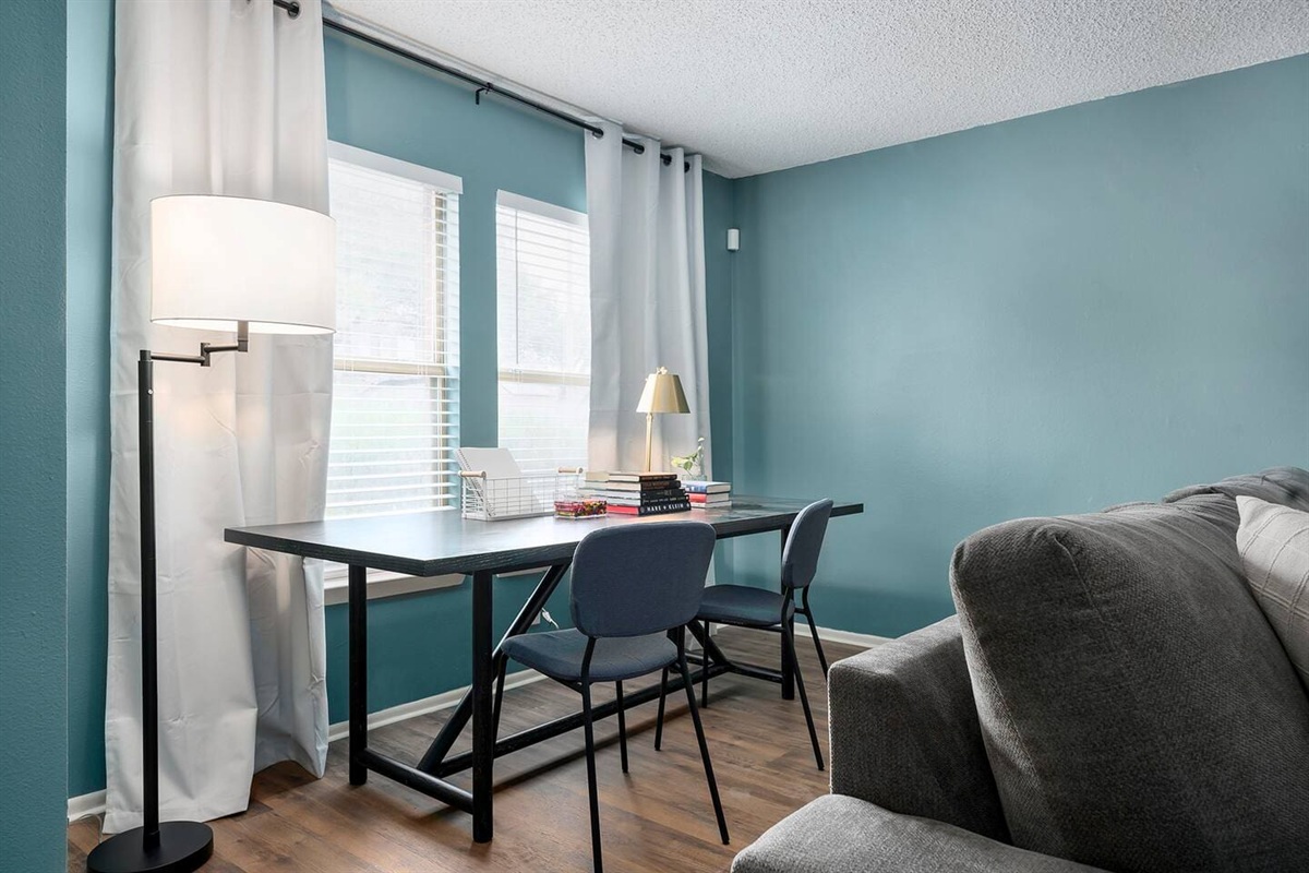 Need to attend to work? Feel free to set up your laptop in the workspace in the living room.