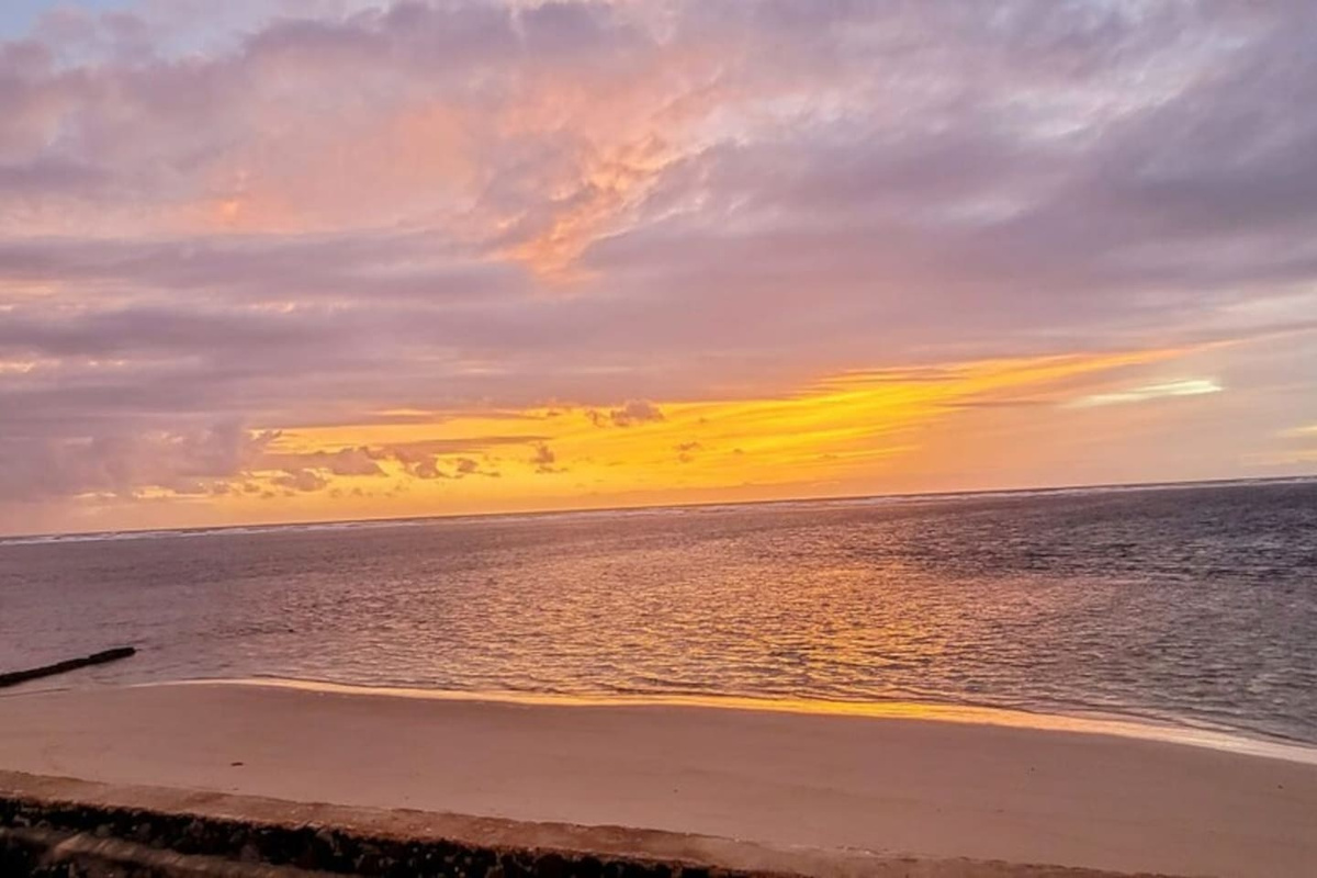 Break of dawn ethereal sunrise at home's very own private beach