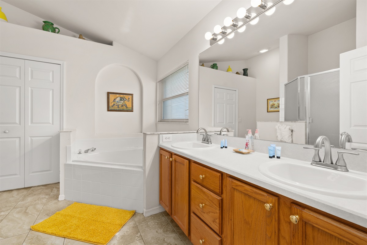 The king bath features a double sink, garden tub and walk-in closet.