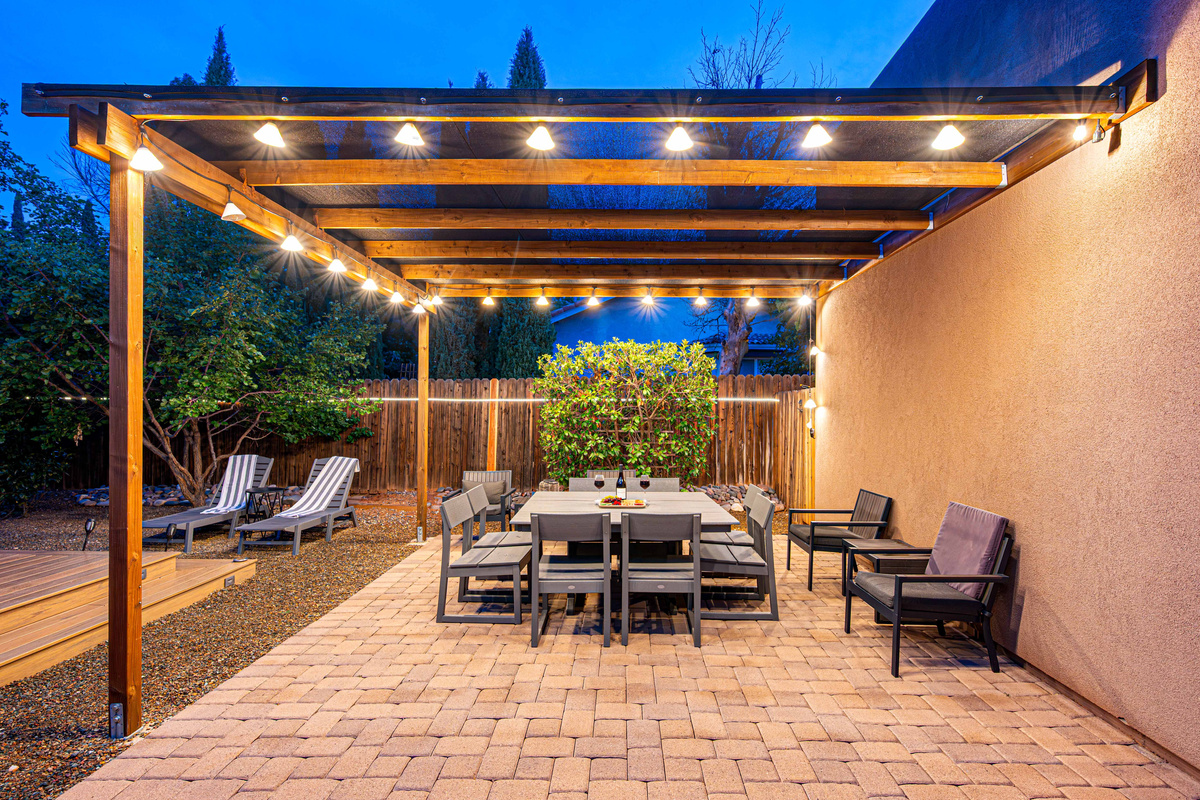 {Backyard} Gather for meals and relaxation on the desert-view patio.