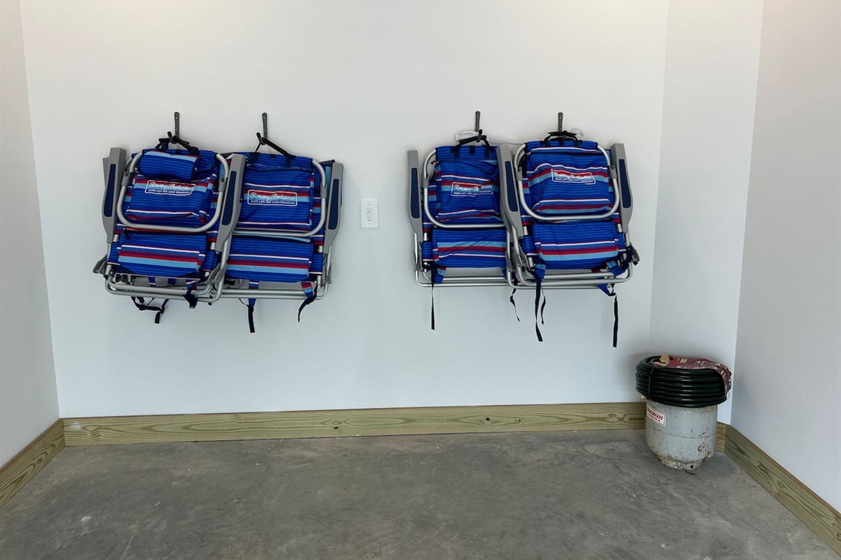 Six Tommy Bahama beach chairs (chairs each have a small cooler and zippered pouch)