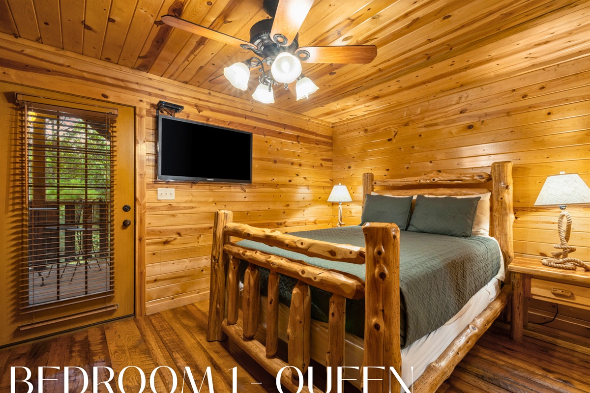 Bedroom with log bed and TV for a cozy retreat.