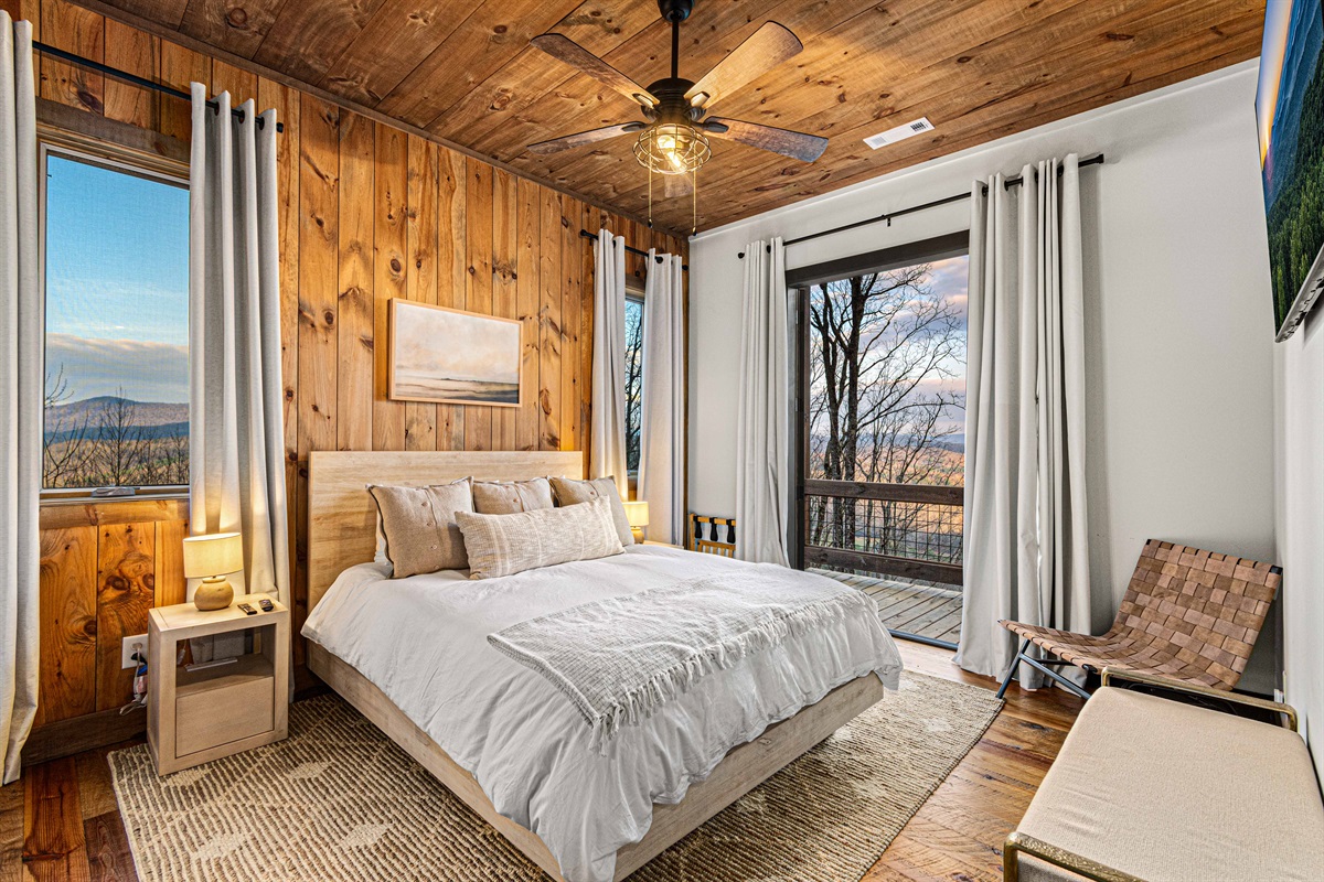 Downstairs Bedroom 3 with entry to the middle deck