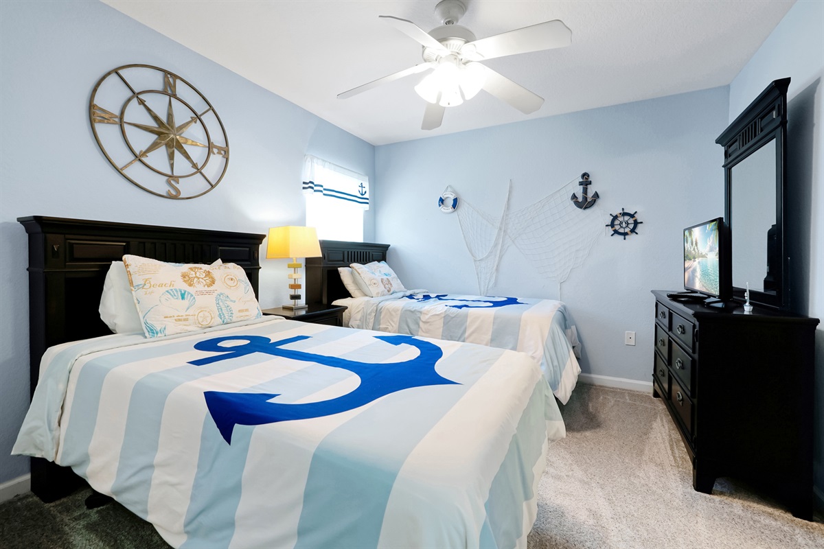 Blue upstairs nautical bedroom