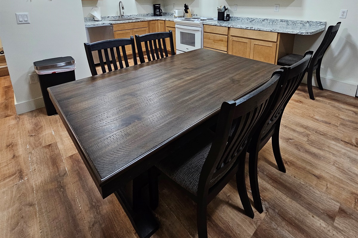 Full Kitchen with Dishwasher, Stove, and Refrigerator / Dining Room