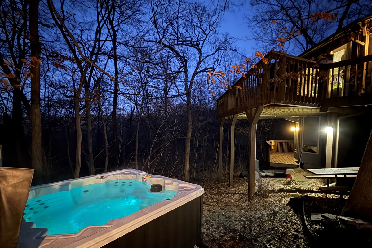 Soak in the brand new hot tub! in a nice wooded setting in the back of the home with nice privacy