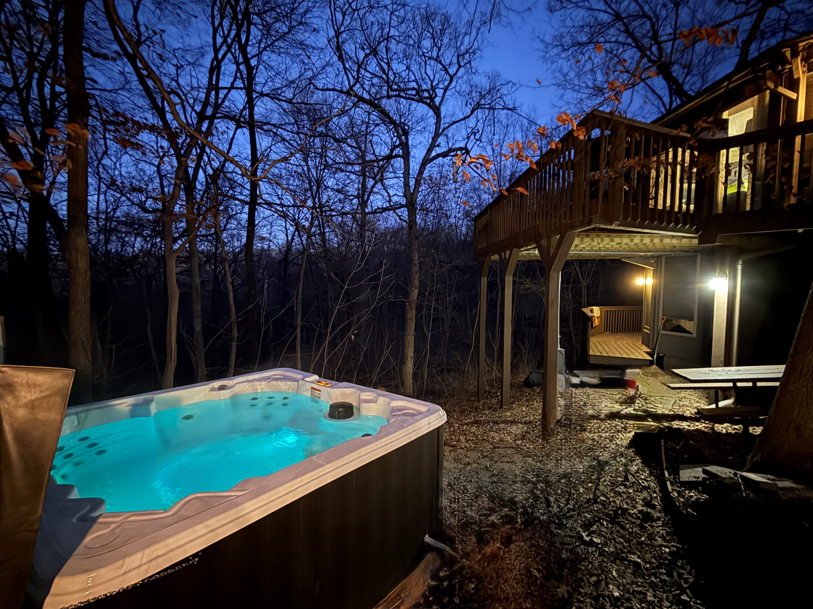 Soak in the brand new hot tub! in a nice wooded setting in the back of the home with nice privacy