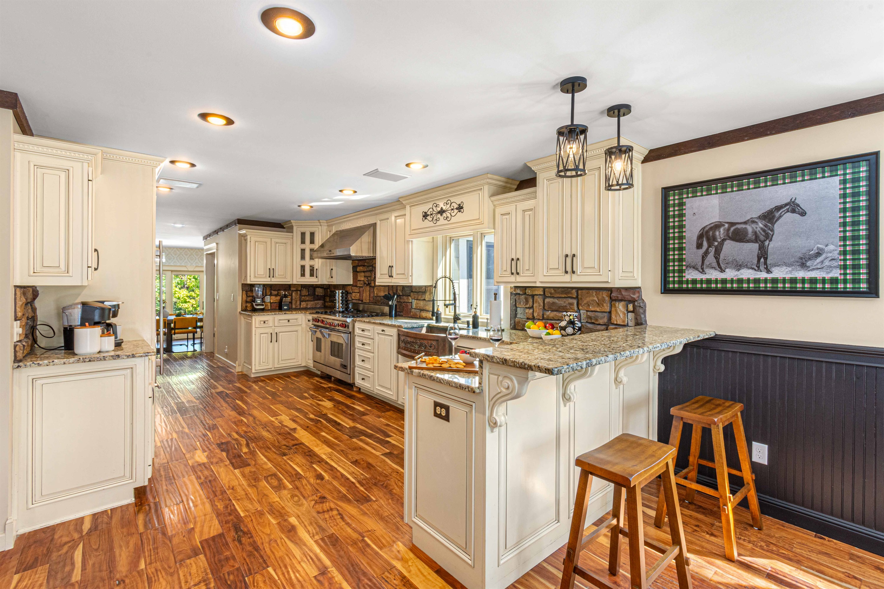 A chefs dream kitchen. Very spacious, huge refrigerator, Wolfe gas stove, 4 ovens, and fully stocked kitchen.
