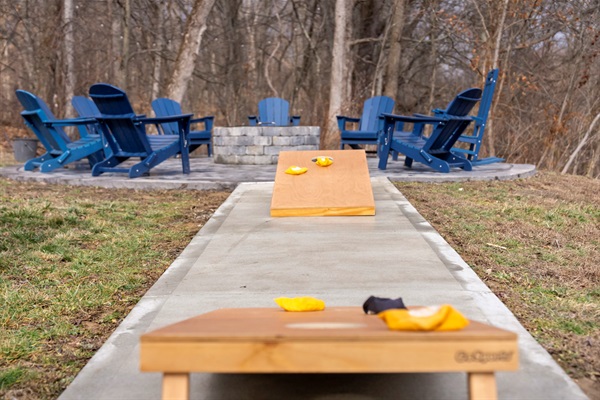 Corn hole challenge by Fire Ring