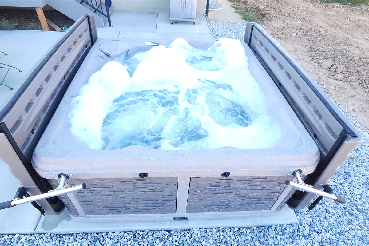 Relax and rejuvenate in your own bubbling hot tub oasis at Wasatch Peak Chateau.