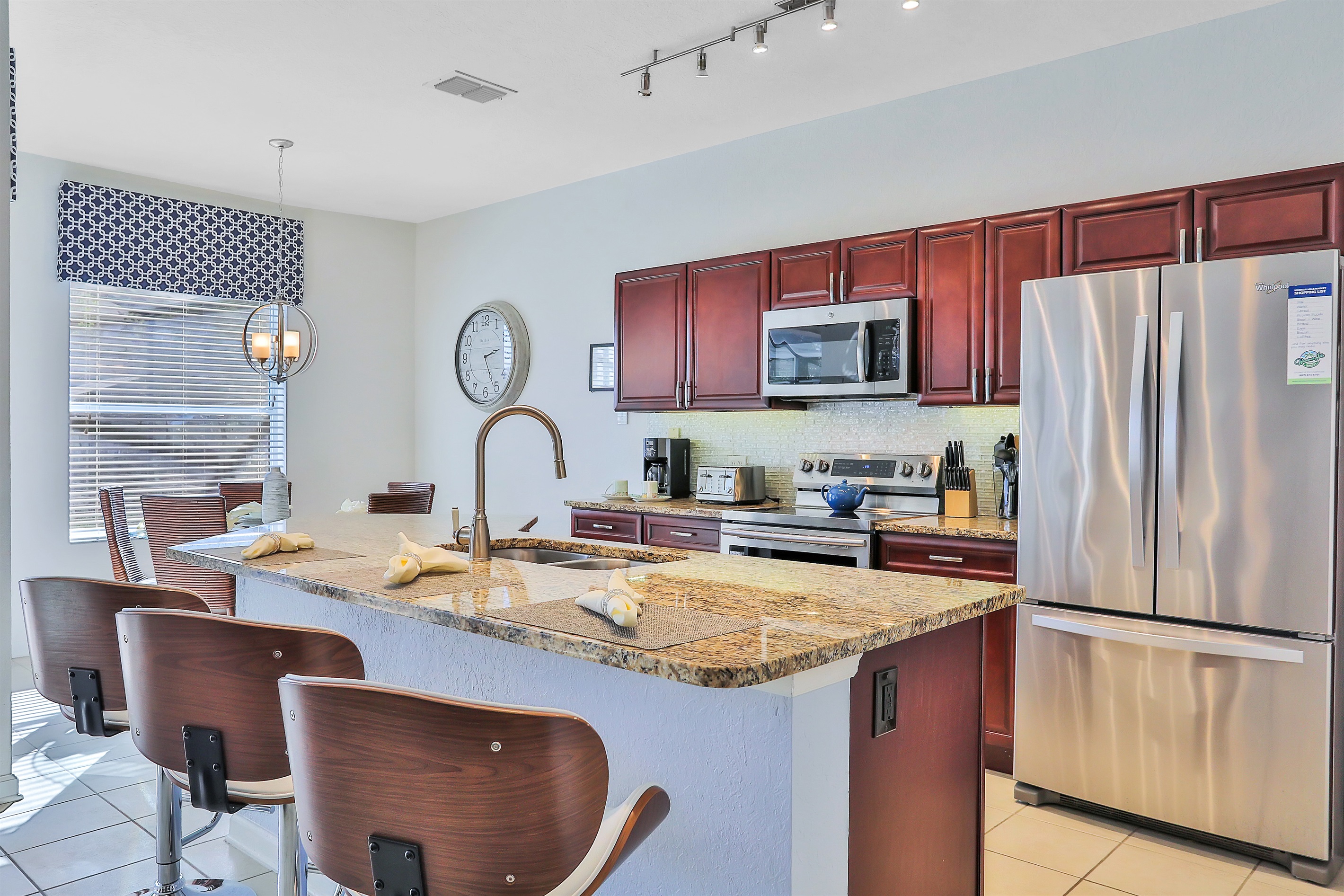 Well equipped granite kitchen