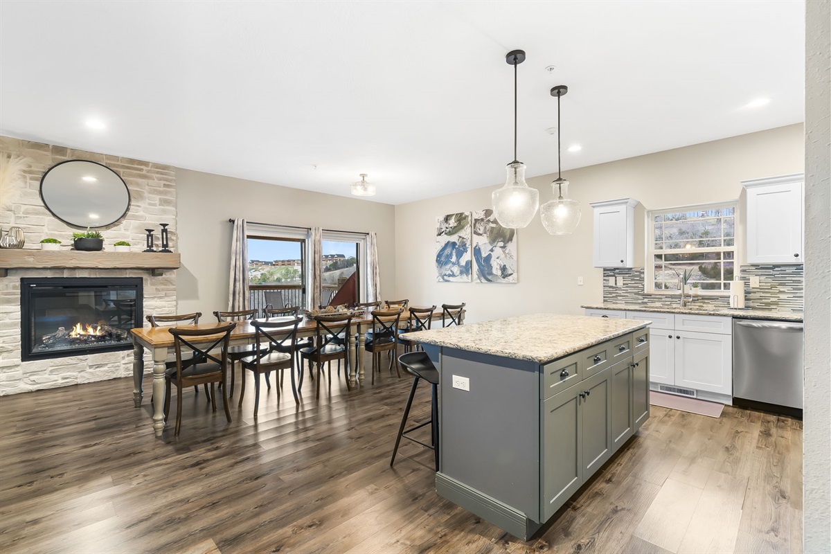 Open kitchen and dining room, with a wonderful electric fireplace!
