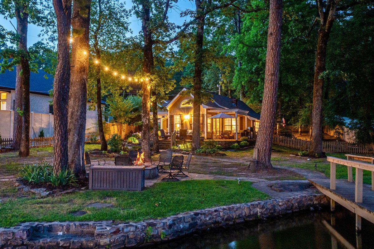Imagine winding down under string lights, surrounded by tall trees and the soothing sounds of nature. Pure backyard bliss.