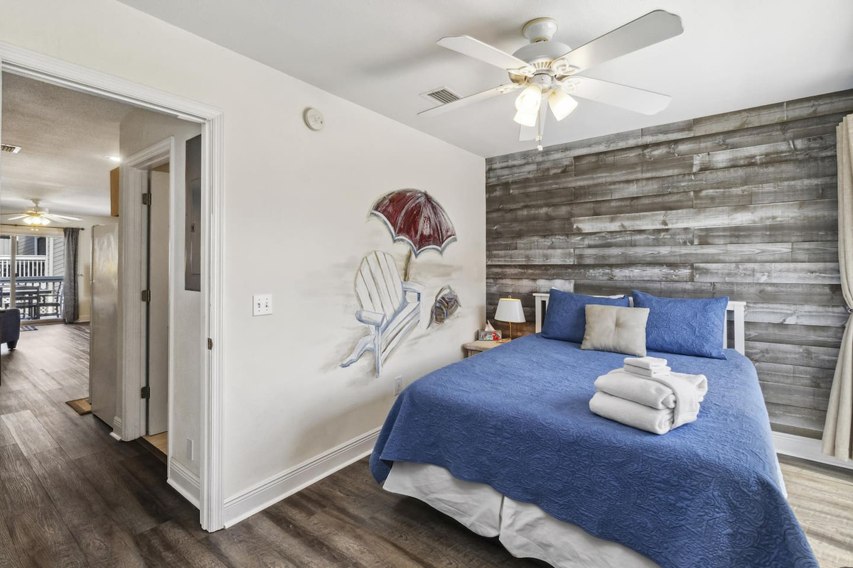 Convenient queen guest room on Main level.