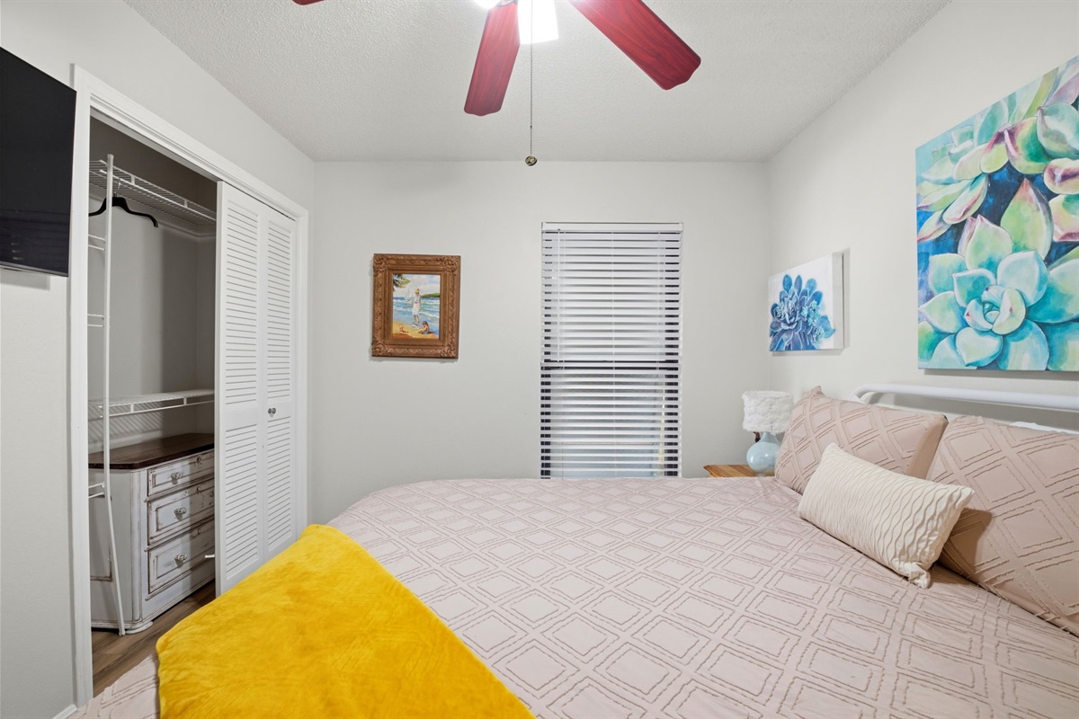 Enjoy a peaceful night’s rest in this inviting bedroom with stylish décor and cozy bedding. The room also includes a spacious closet and plenty of natural light, making it both comfortable and convenient for guests.