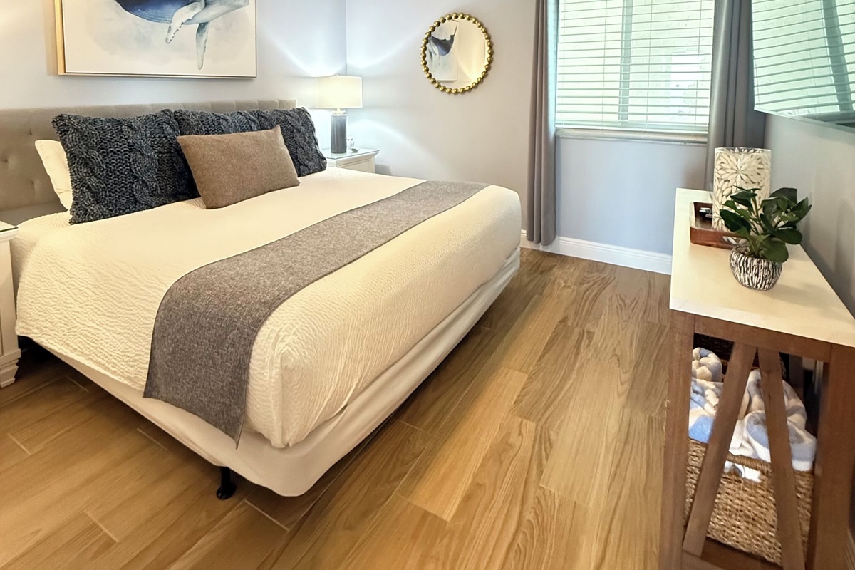 King bed and a 55” flat screen SmartTV