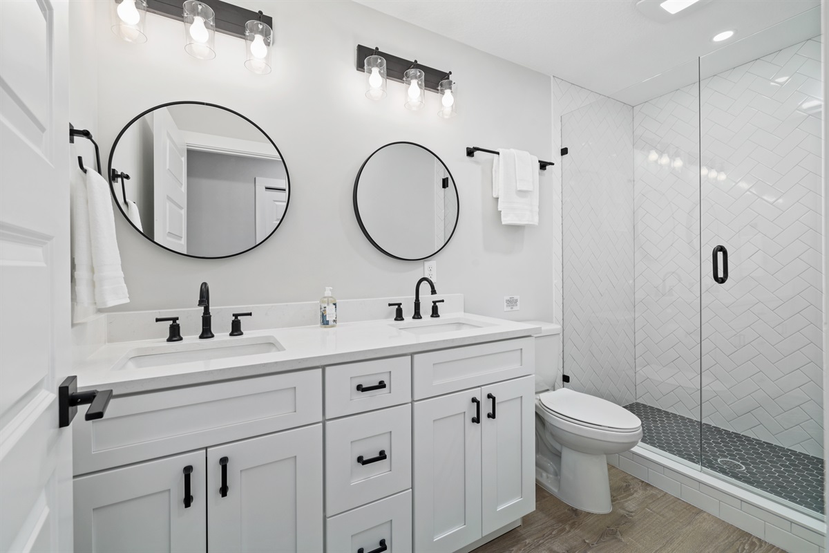 and large master shower with double sinks