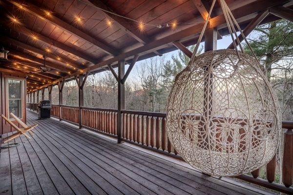Wrap around porch with grills and seating
