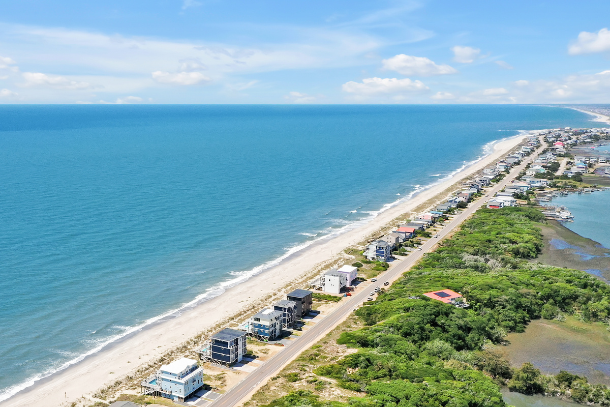 Enjoy Oak Island in an exceptional home and create timeless memories