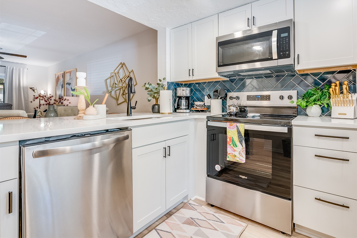 Sleek stainless steel appliances make cooking a breeze.