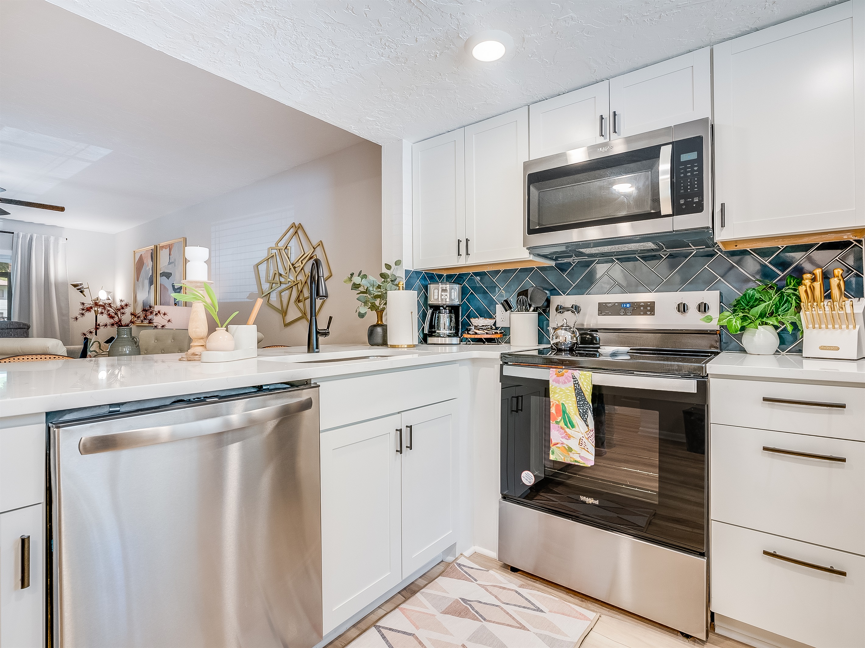 Sleek stainless steel appliances make cooking a breeze.
