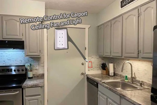 Side Door to Carport and Laundry Room.  Carport ceiling fan and light controlled by remote next to this side door.