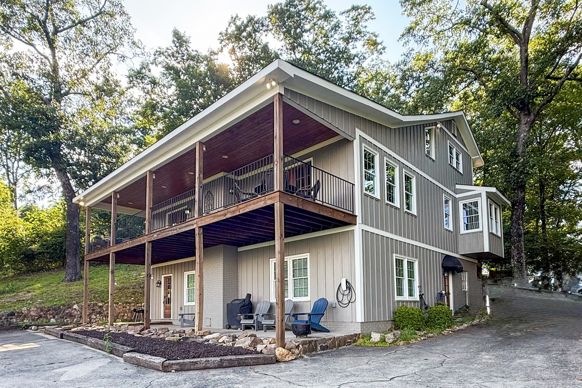 The balcony, attached to the back of the house on the second story, offers a peaceful spot to enjoy the view.