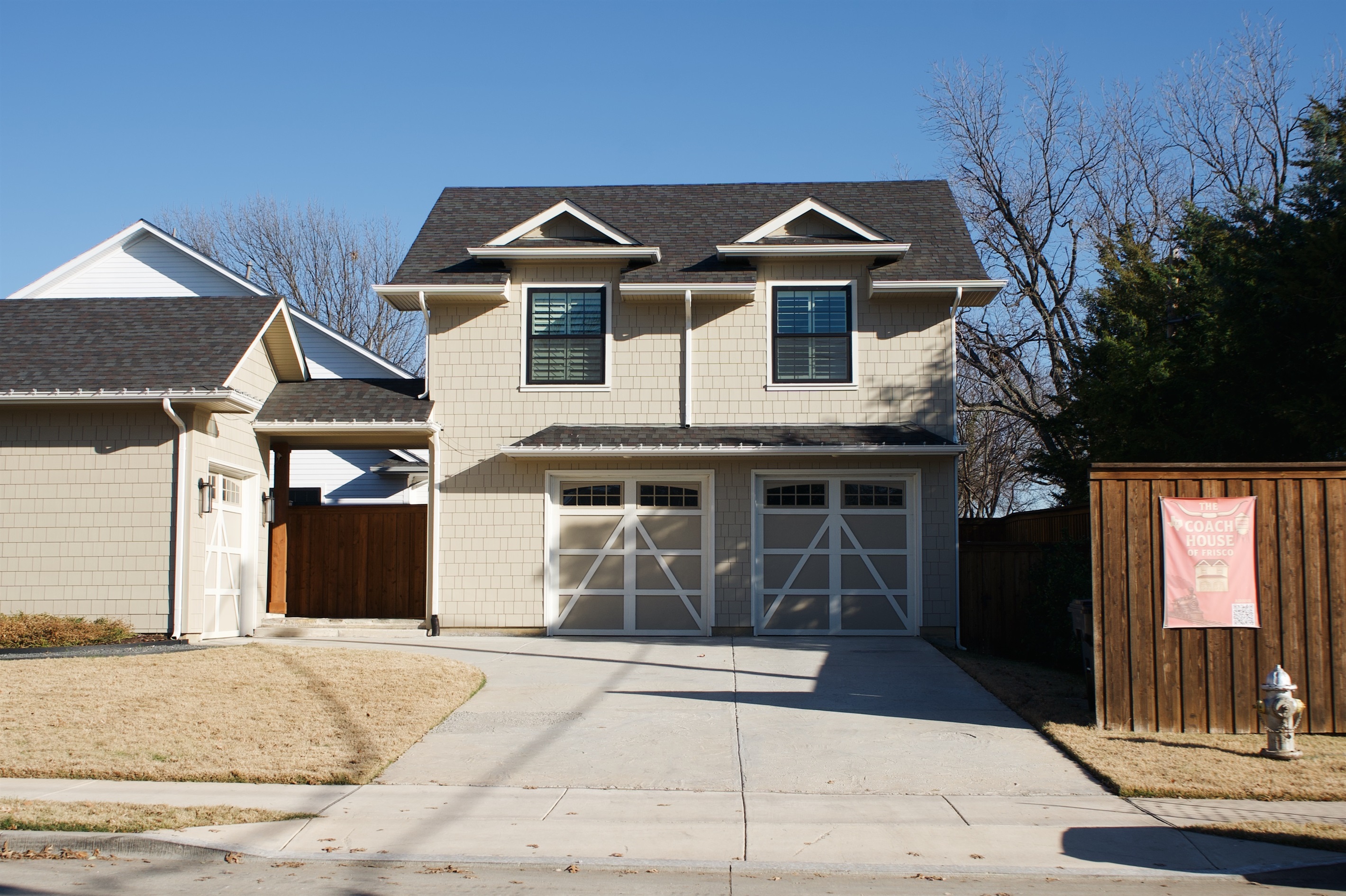 Private coach house apartment located above the garage with its own entrance.