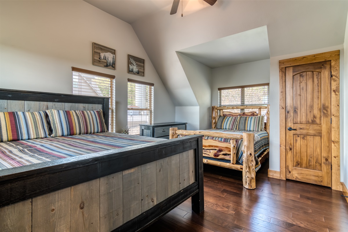 The two upper bedrooms each have King and a Queen bed in each room!