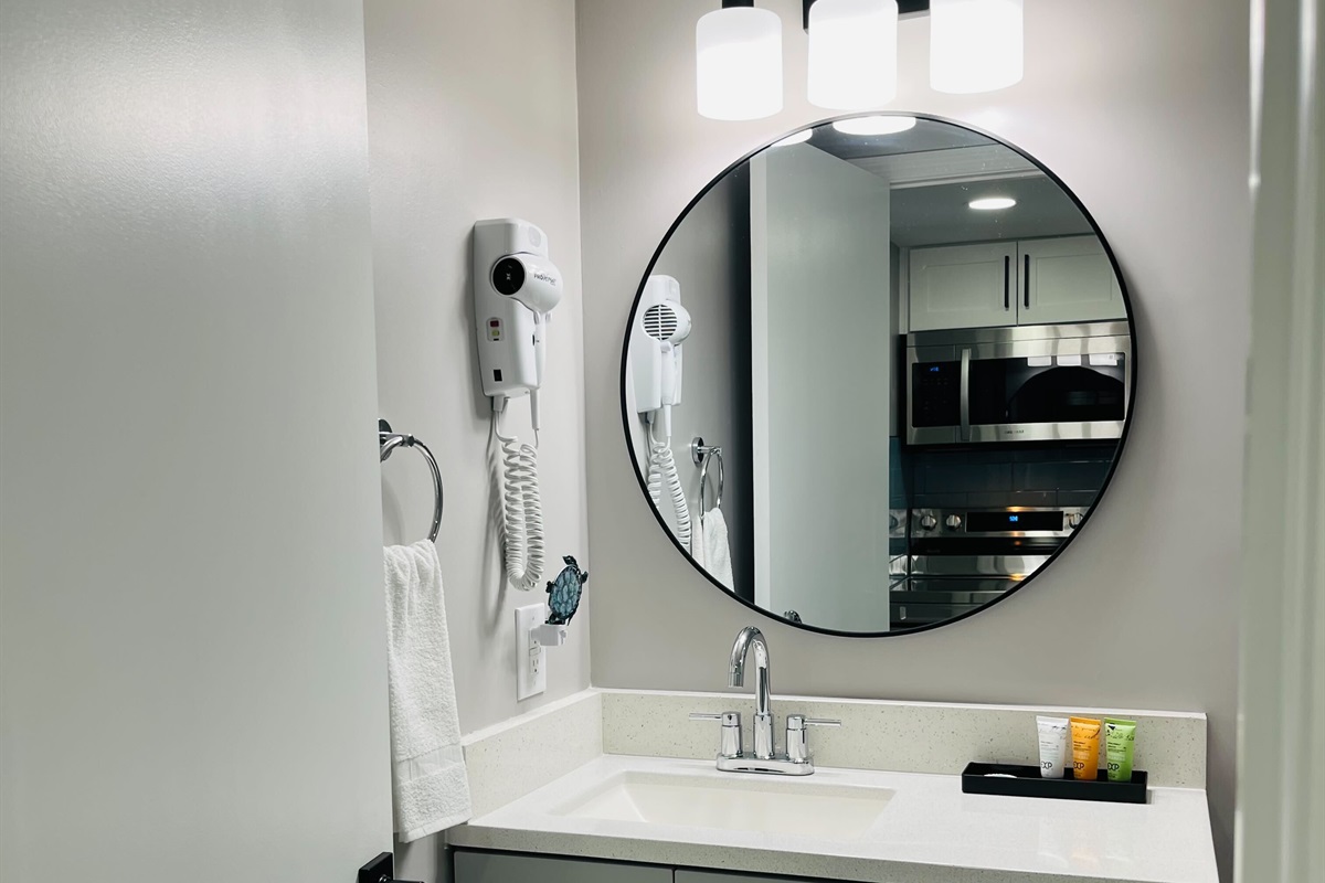 Start your day right with a full bathroom equipped for all your prepping needs.