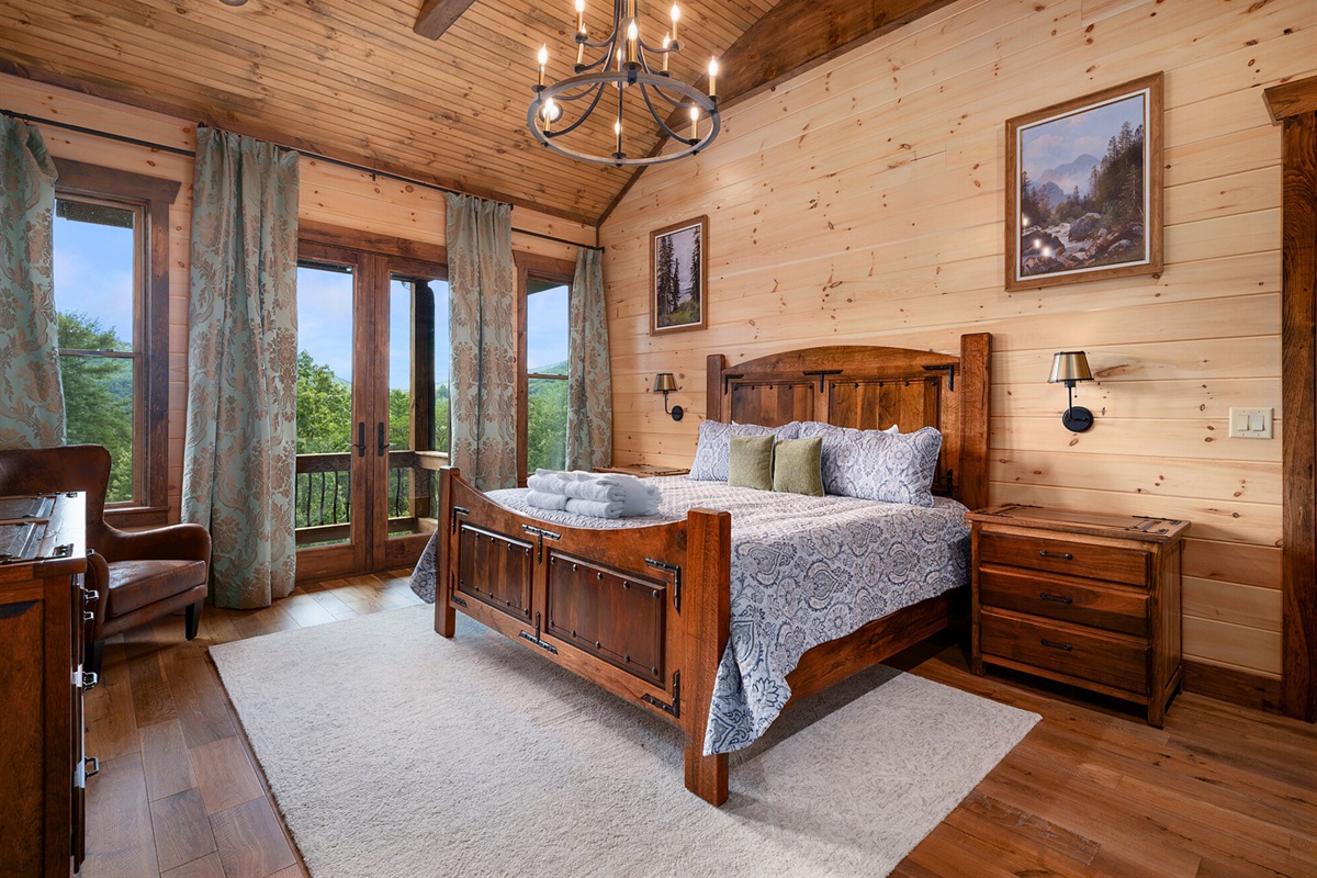 Rest easy in this spacious king bedroom, offering comfort and a peaceful atmosphere.