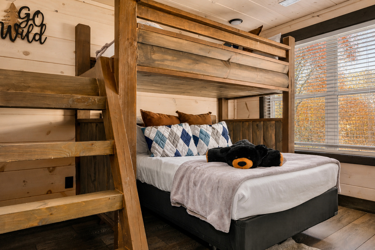 Our fifth bedroom is an adorable bunkroom featuring a twin bed up top and full bed below.