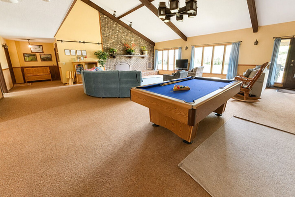 Rack 'em up! The Great Room pool table is a favorite gathering spot for guests of all ages.