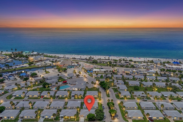 Golden-hour skies reveal the peaceful beauty of Villa 61’s Manasota Key neighborhood.
