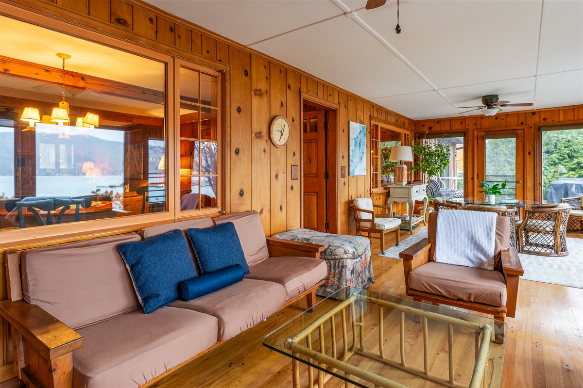 Cozy sun room for morning coffee or evening wine with beautiful views of the lake
