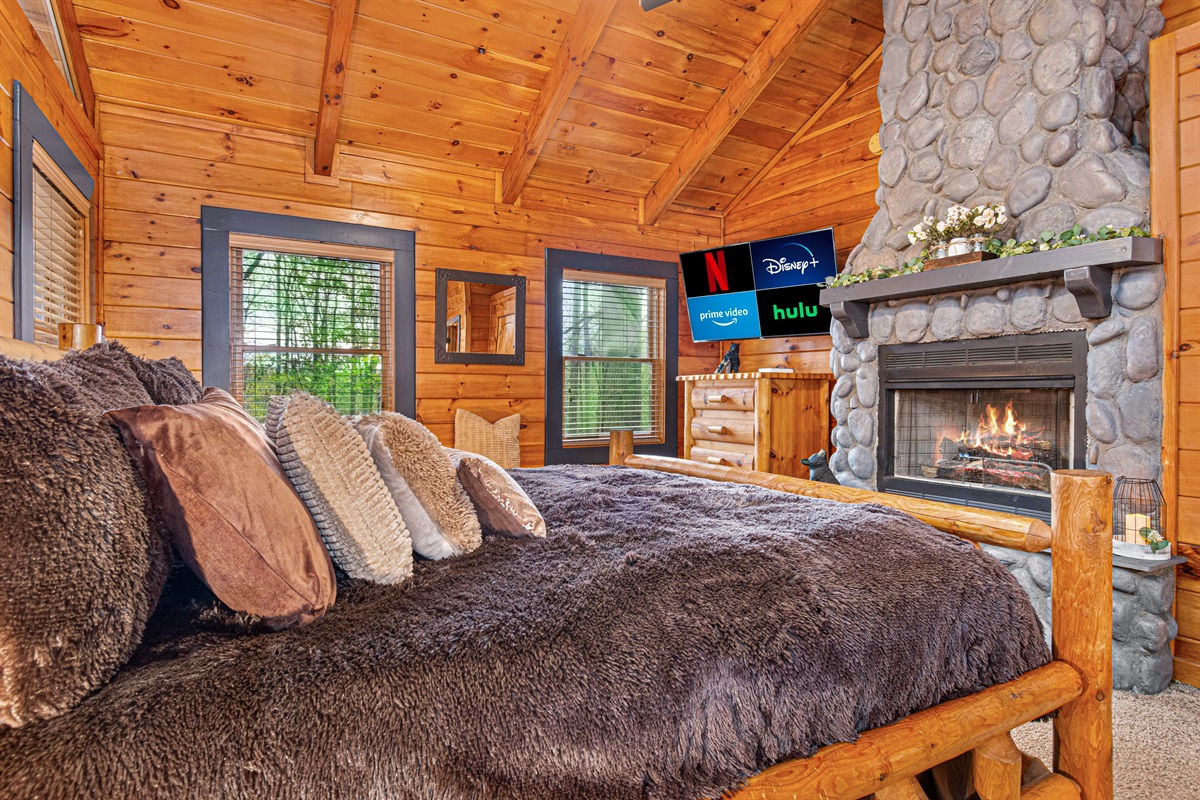 A massive fireplace, two streaming TV's. What more do you want?