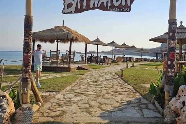 Beach bar at XI Beach,  about a 20 min drive from the property.