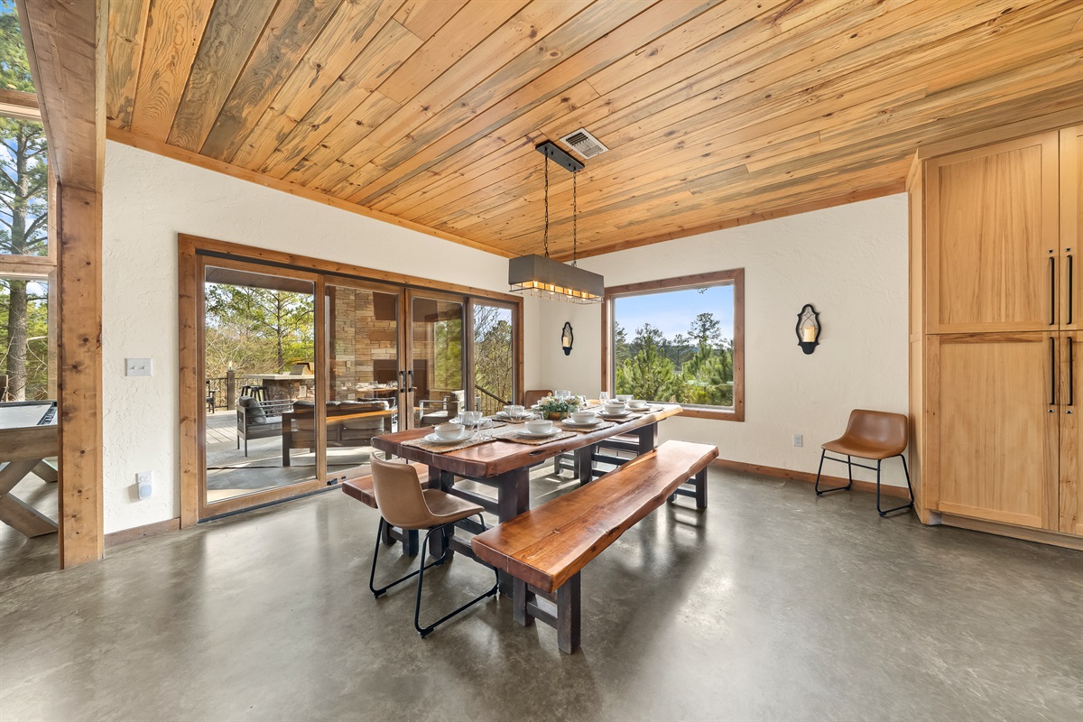 Gather around the custom live edge table with seating for ten for meals and games. 