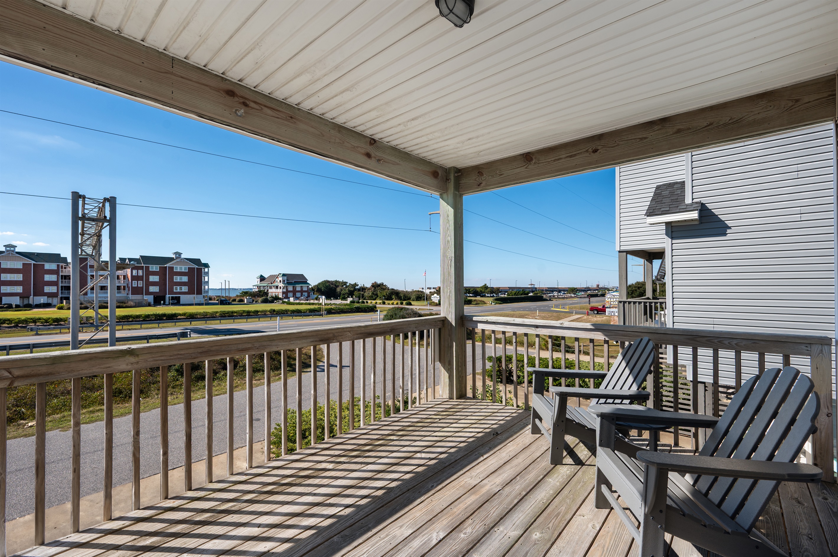 Second-floor deck right outside the Queen bedroom with neighborhood views.