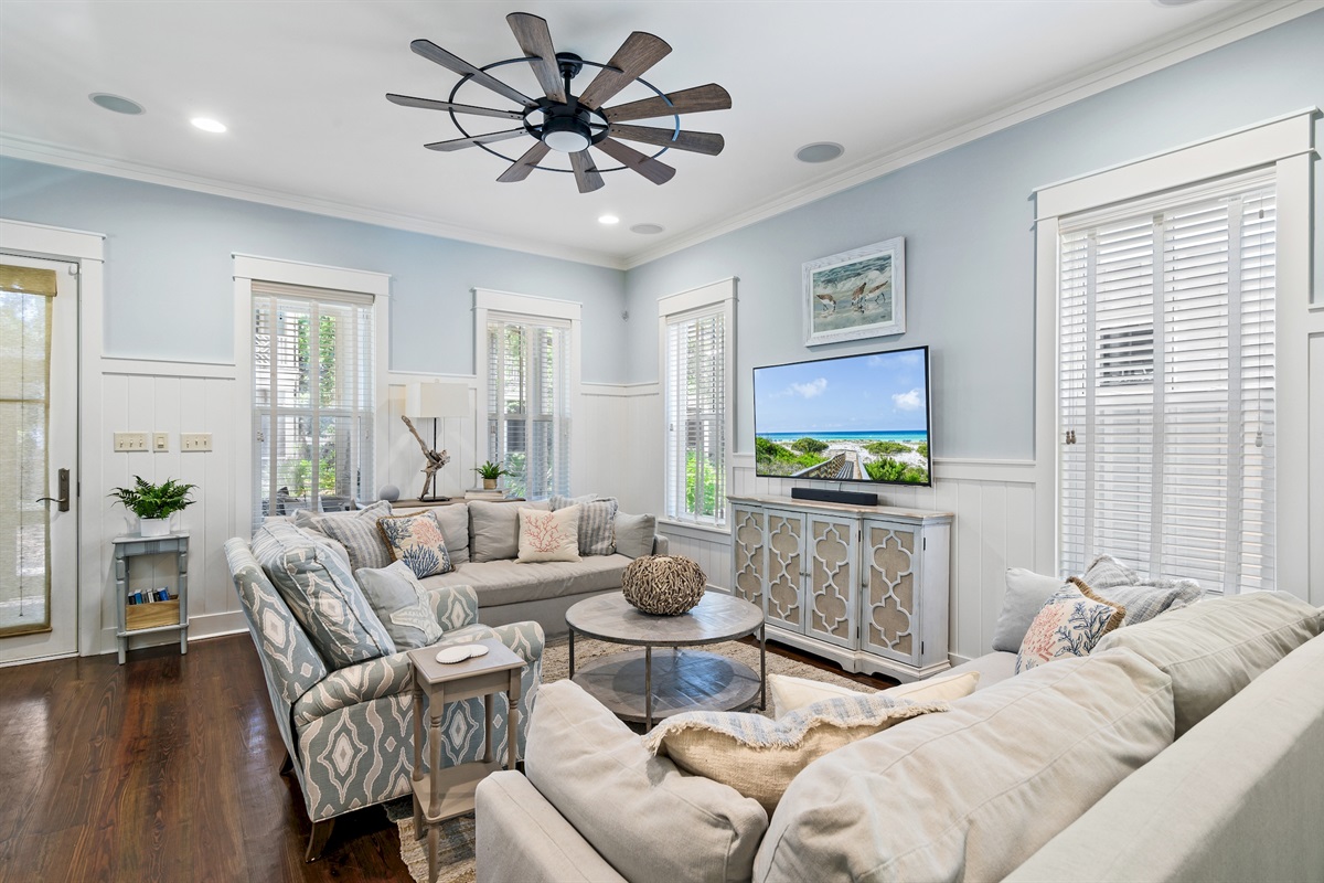 Bright, open living space designed for gathering &mdash; spacious seating, natural light, and room for the whole group.