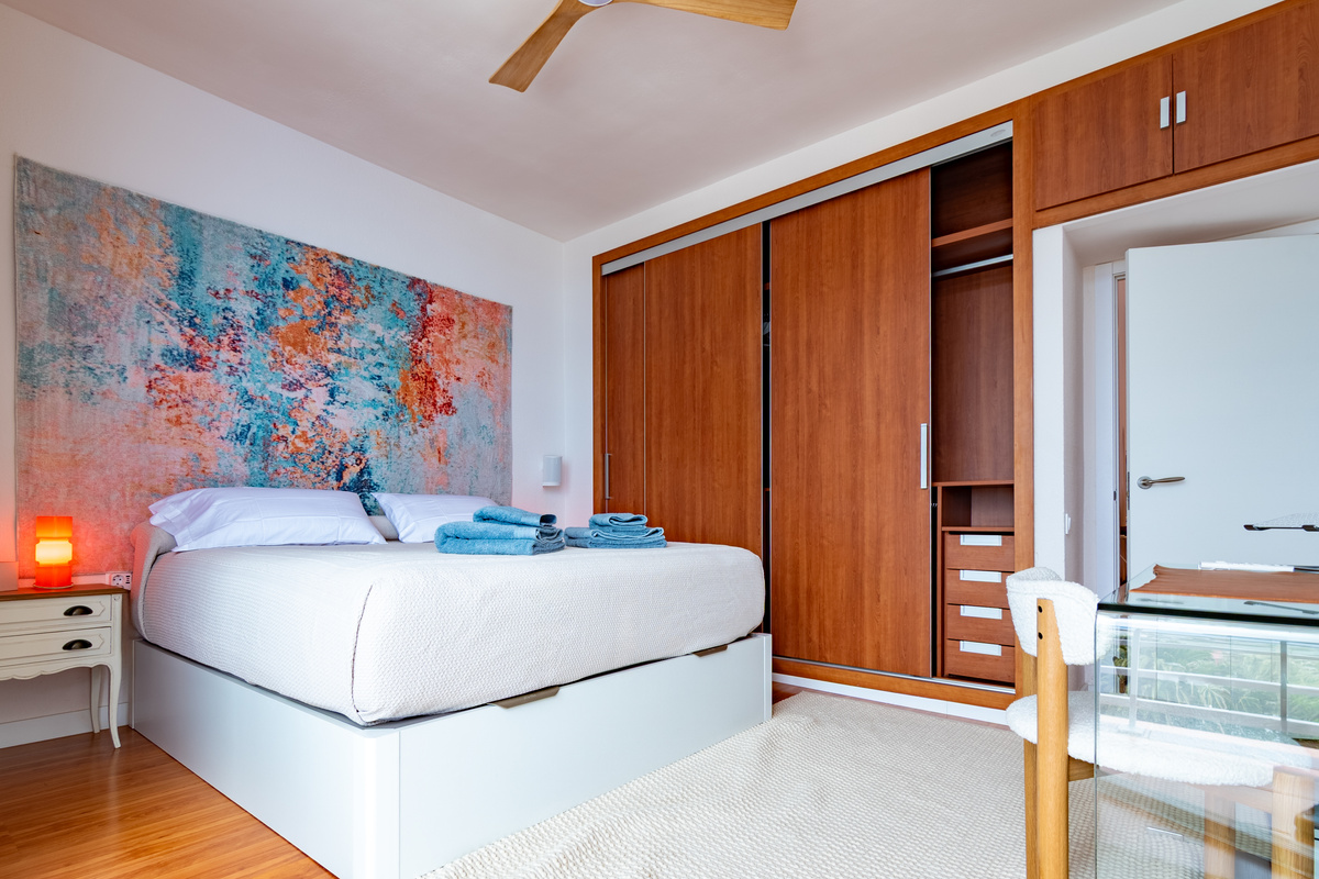 Main bedroom with generous storage and a peaceful feel